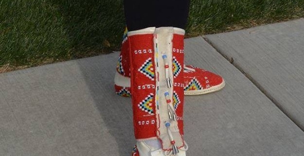 Rock Your Mocs with a person wearing their moccasins