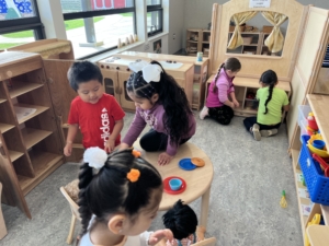 A group of children playing with toys