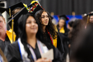A group of people in graduation gowns