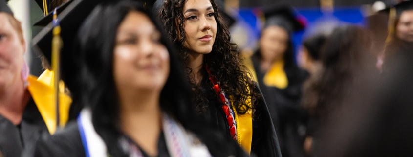 A group of people in graduation gowns