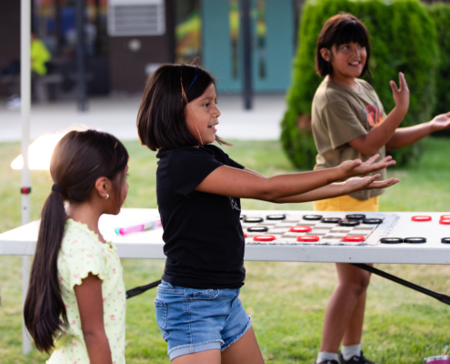 HeritageRiseUp-EW-03 A group of children playing checkers