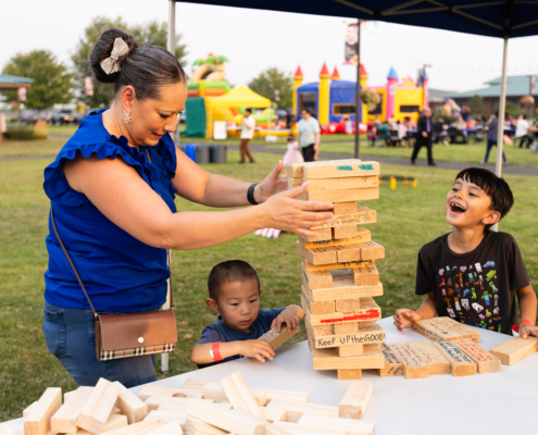 HeritageRiseUp-EW-16 A woman and kids playing with blocks