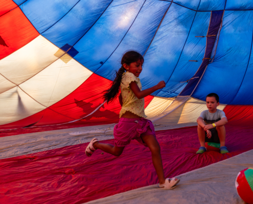 HeritageRiseUp-EW-20 A child running in a hot air balloon