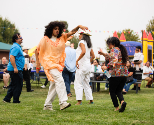 HeritageRiseUp-EW-27 A group of people dancing on grass