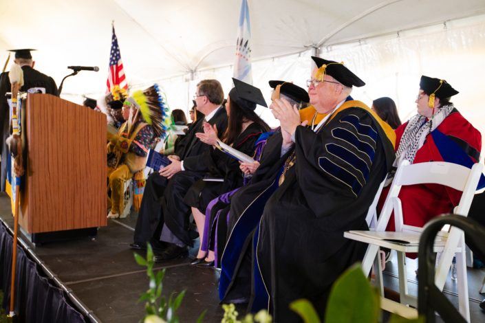 Presidential Inauguration: Installation A group of people sitting near a podium