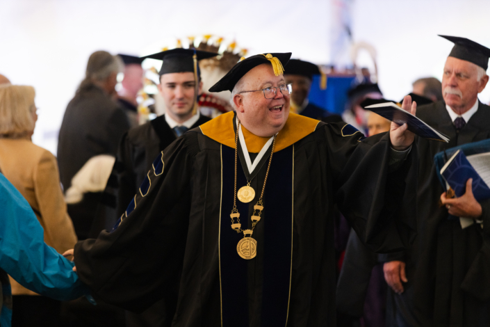 Presidential Inauguration: Installation A person in a graduation gown