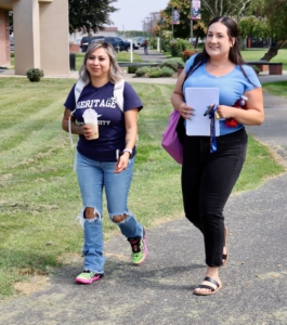 Two women walking on a path