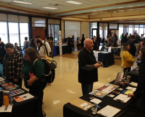 A group of people at a convention-like gathering