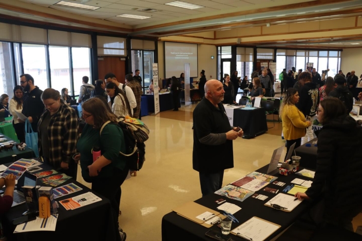 A group of people at a convention-like gathering