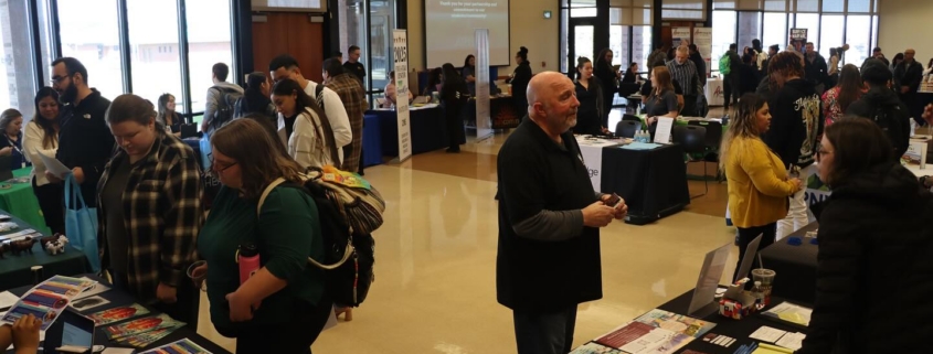 A group of people at a convention-like gathering