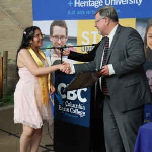 A person shaking hands with a person